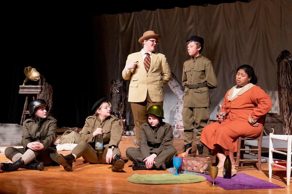 students on stage in a one act play 