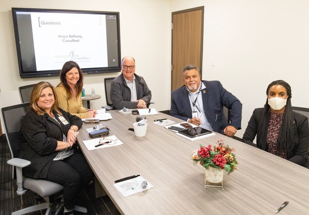 Administrators sitting at a conference table